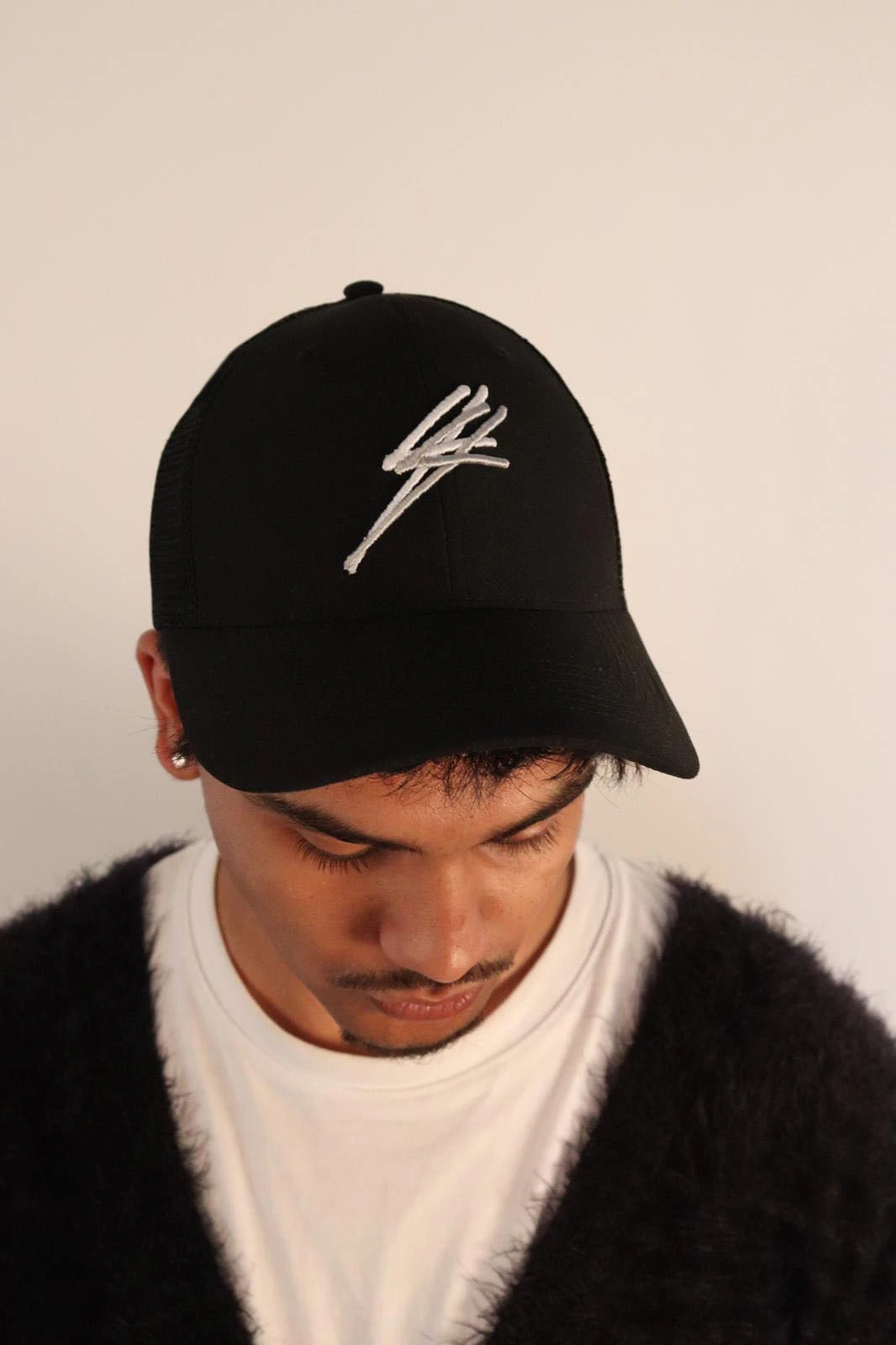 Photo de mathias vue de haut, casquette à filet noir